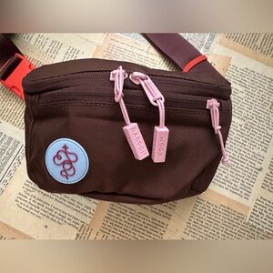 Baboon To The Moon Hip Pack Brown Crossbody Bag with Pink Accents